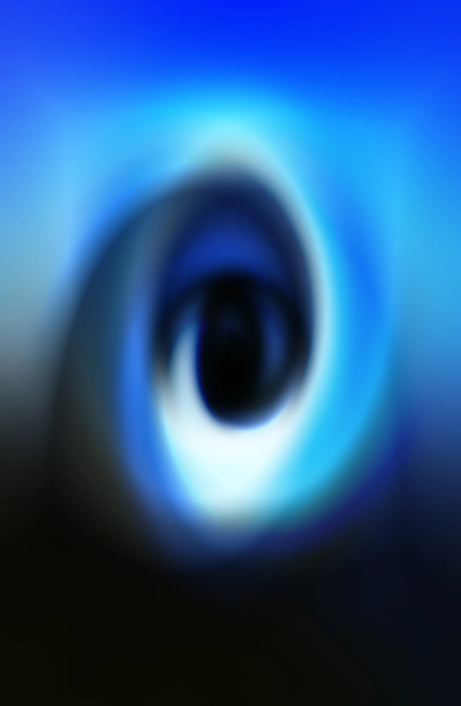 An eye-like form emerges from colour, texture and abstraction.