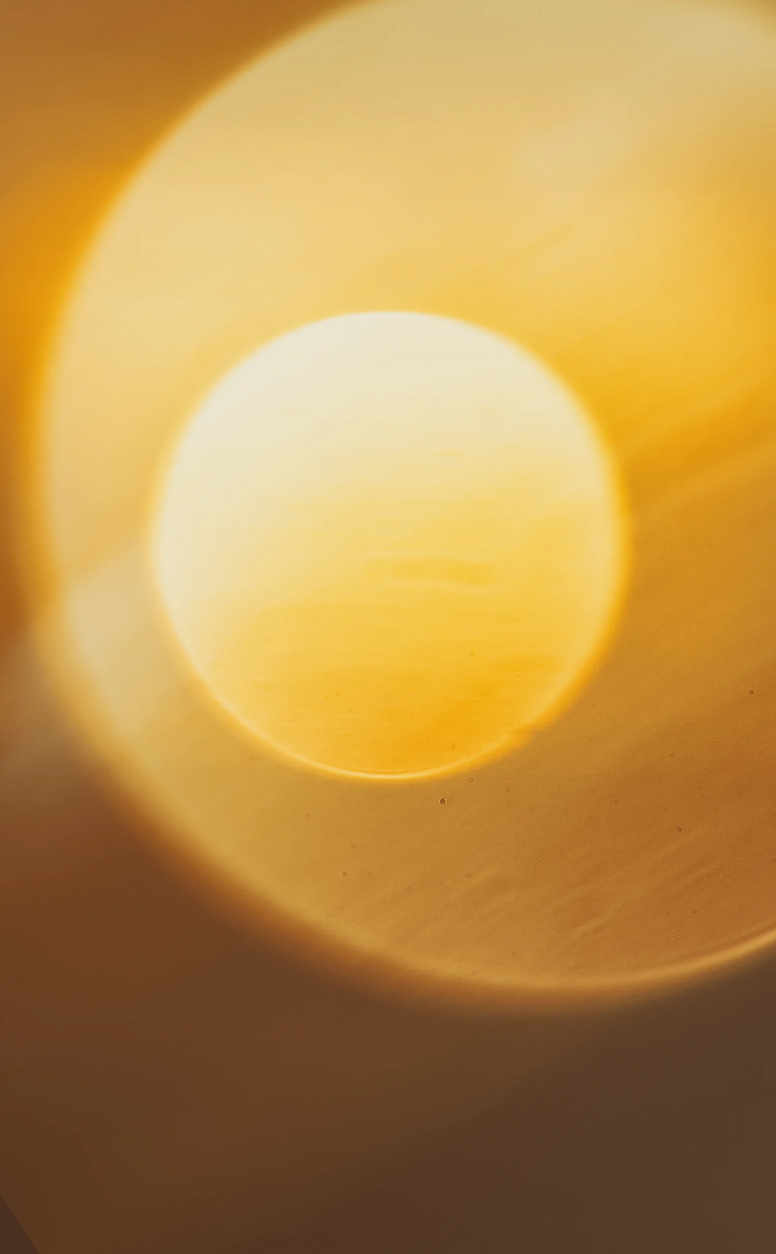 Two bright suns appear together in a winter evening sky.